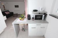 Kuchyňa alebo kuchynka v ubytovaní Apartments Polenta