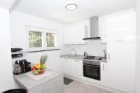 Kuchyňa alebo kuchynka v ubytovaní Apartments Polenta