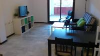 Televízia a/alebo spoločenská miestnosť v ubytovaní Apartamento Ayamonte golf Costa Esuri