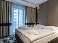 Posteľ alebo postele v izbe v ubytovaní VacationClub – Baltic Park Fort Apartament F.311