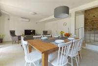 Televízia a/alebo spoločenská miestnosť v ubytovaní Holiday home Barbarella