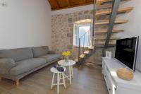 Televízia a/alebo spoločenská miestnosť v ubytovaní Holiday home Barbarella