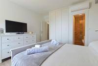 Posteľ alebo postele v izbe v ubytovaní Holiday home Barbarella