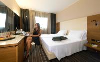 A bed or beds in a room at Hotel D120