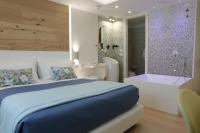 Posteľ alebo postele v izbe v ubytovaní Astrea Wellness & Spa