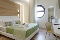 Posteľ alebo postele v izbe v ubytovaní Astrea Wellness & Spa