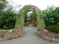 Een tuin van The Mill Forge Hotel