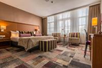 Een bed of bedden in een kamer bij Hotel Amstelzicht