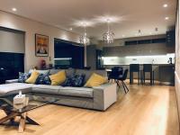 Posezení v ubytování Luxury & Stylish Family Apartment