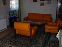 Televízia a/alebo spoločenská miestnosť v ubytovaní Al Do Apartman