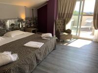 Posteľ alebo postele v izbe v ubytovaní Savoia Hotel Regency