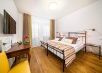 Postel nebo postele na pokoji v ubytování Bellevue Hotel Benešov