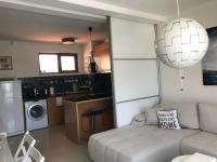 Kuchyň nebo kuchyňský kout v ubytování Paradise Bay D8 Apartment