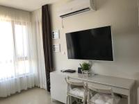 TV a/nebo společenská místnost v ubytování Paradise Bay D8 Apartment