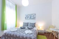 Posteľ alebo postele v izbe v ubytovaní Apartment Tessa