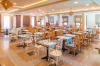 A restaurant or other place to eat at Mediterranean Resort