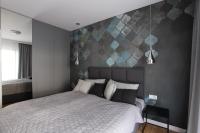 Łóżko lub łóżka w pokoju w obiekcie Apartament Gardenia Sea&Sun DZIWNÓW PRZY PLAŻY