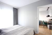 Łóżko lub łóżka w pokoju w obiekcie Apartament Gardenia Sea&Sun DZIWNÓW PRZY PLAŻY