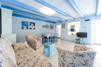 Posedenie v ubytovaní Seaside Villas Eli