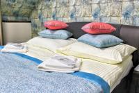 Postel nebo postele na pokoji v ubytování Apartments 461