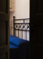 A bed or beds in a room at iTrulliescape