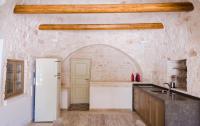 A kitchen or kitchenette at iTrulliescape