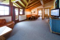 Televízia a/alebo spoločenská miestnosť v ubytovaní Gästehaus Brantlhof Zimmer und Ferienwohnungen in Going am Wilden Kaiser