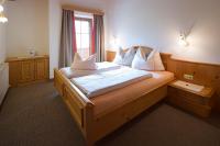 Posteľ alebo postele v izbe v ubytovaní Gästehaus Brantlhof Zimmer und Ferienwohnungen in Going am Wilden Kaiser