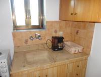Kuchyň nebo kuchyňský kout v ubytování Chris Apartments