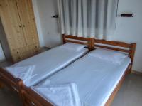 Postel nebo postele na pokoji v ubytování Chris Apartments