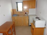 Kuchyň nebo kuchyňský kout v ubytování Chris Apartments