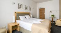 Posteľ alebo postele v izbe v ubytovaní 404 Rooms Wilanowska