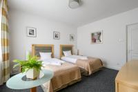 Posteľ alebo postele v izbe v ubytovaní 404 Rooms Wilanowska