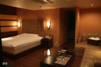 Hotel MINT Osaka Airportにあるベッド