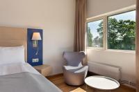 Postel nebo postele na pokoji v ubytování Quality Hotel Expo
