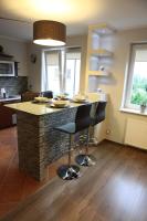Kuchyň nebo kuchyňský kout v ubytování Apartament-Studio