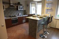 Kuchyň nebo kuchyňský kout v ubytování Apartament-Studio