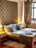 Łóżko lub łóżka w pokoju w obiekcie Baron Boutique Hotel