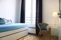 Postel nebo postele na pokoji v ubytování Luxury Apartment in Plaza de España