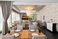 Reštaurácia alebo iné gastronomické zariadenie v ubytovaní Hotel Areca