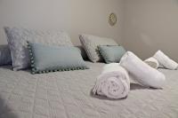 Posteľ alebo postele v izbe v ubytovaní Apartamentos Credencial