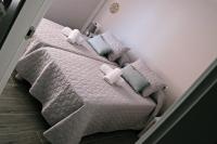 Posteľ alebo postele v izbe v ubytovaní Apartamentos Credencial