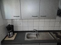 Kuchyň nebo kuchyňský kout v ubytování Socrates Apartments