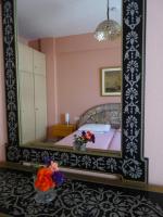 Postel nebo postele na pokoji v ubytování Socrates Apartments