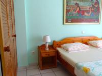 Postel nebo postele na pokoji v ubytování Socrates Apartments