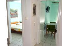 Postel nebo postele na pokoji v ubytování Socrates Apartments