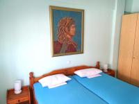 Postel nebo postele na pokoji v ubytování Socrates Apartments