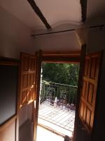 A balcony or terrace at Casa Rural y Albergue Tormon