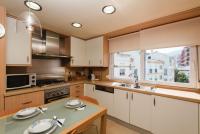 Kuchyň nebo kuchyňský kout v ubytování BELLA VISTA LUXURY APARTMENT