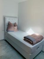 Posteľ alebo postele v izbe v ubytovaní Hideaway Obertraun